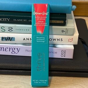 Thrive Causemetics Ultra-Glossy Lip Serum in Red and Teal